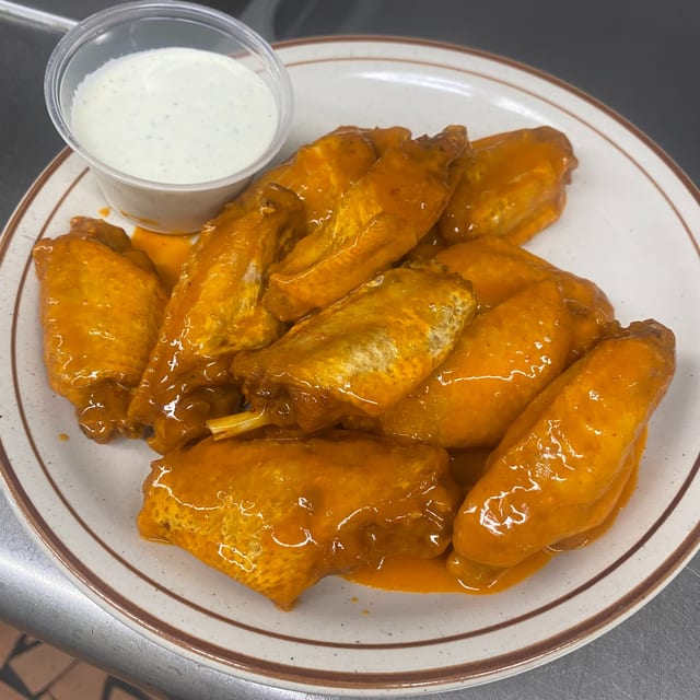 25 Wings With 1/2 Gal Tea (To Go Only).
